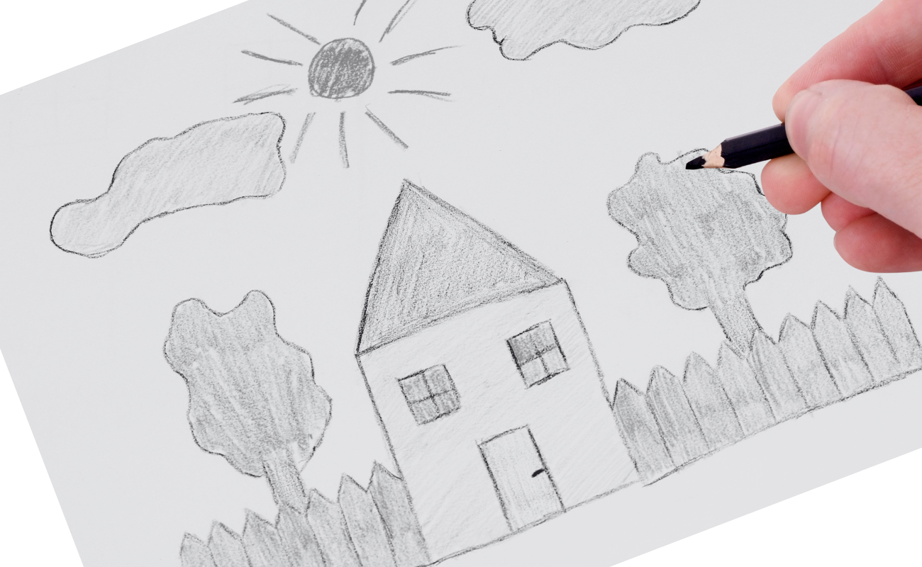 A hand holding a pencil over a piece of paper. On the paper is a drawing of a house and garden.